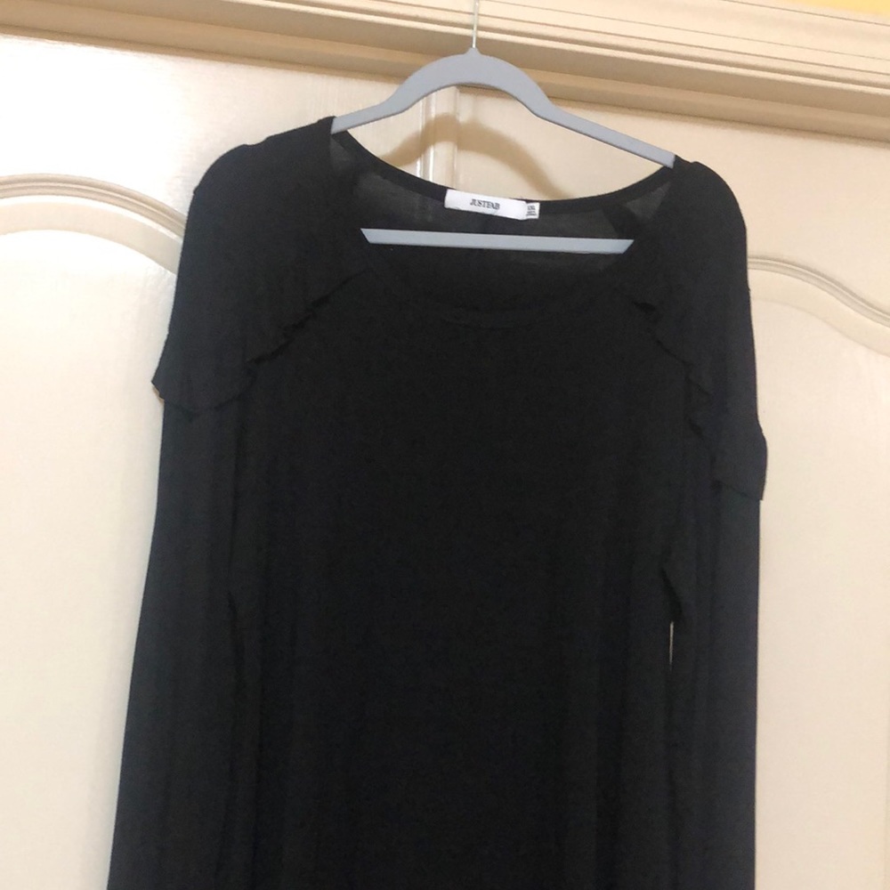 Black long sleeve top with shoulder ruffle
